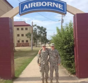 two army cadets in front of the Airborne School